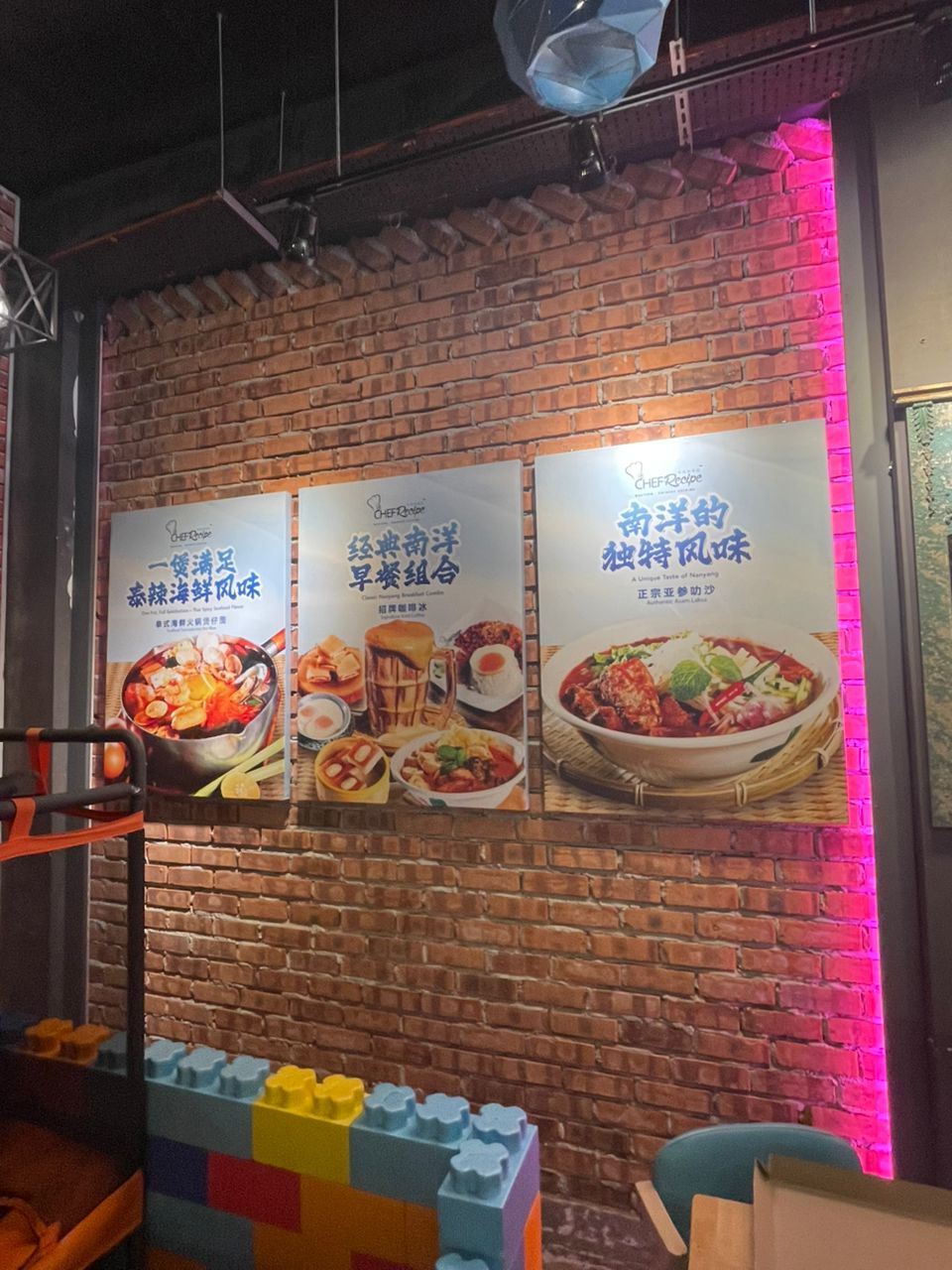 Wall-mounted wooden menu poster display for restaurant by A&T JB
