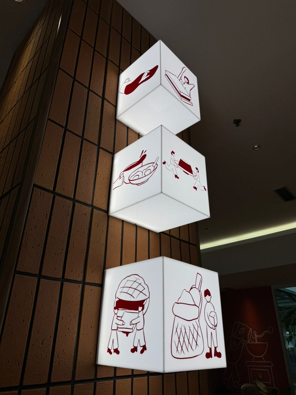 Antara Cafe three stacked decorative cube acrylic lightboxes interior feature wall JB