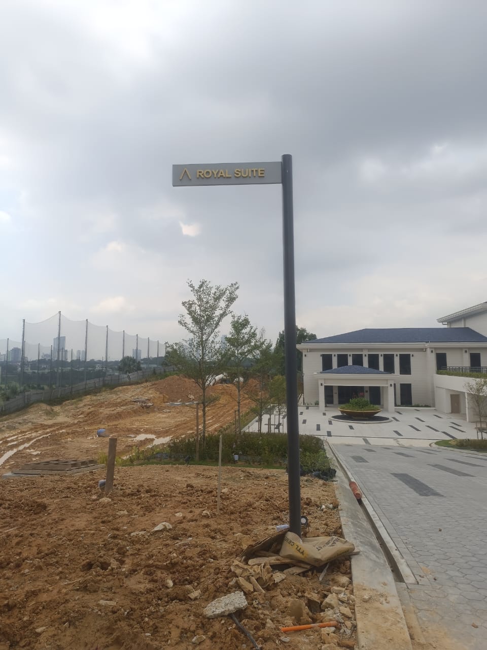 JGCC Royal Suite direction sign on an aluminium pole