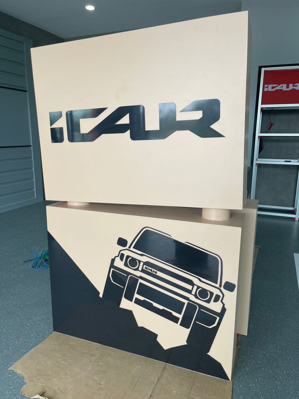 iCAR Kluang showroom acrylic display unit with vehicle graphic panel Johor